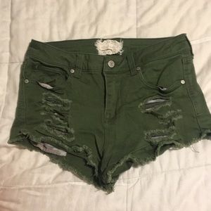 green denim shorts